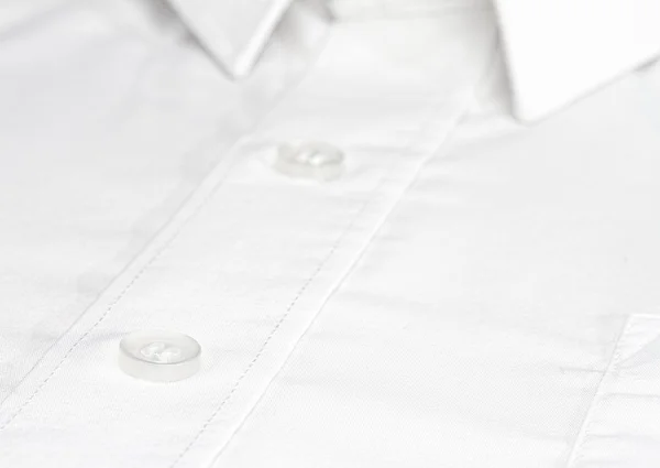 Witte formele shirt met witte knop Close-up — Stockfoto