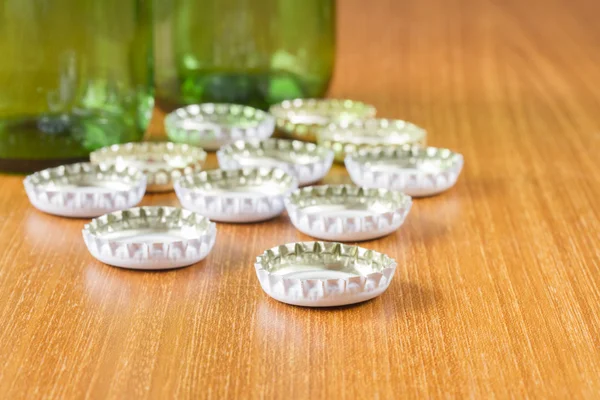 Beer bottles with white caps — Stock Photo, Image