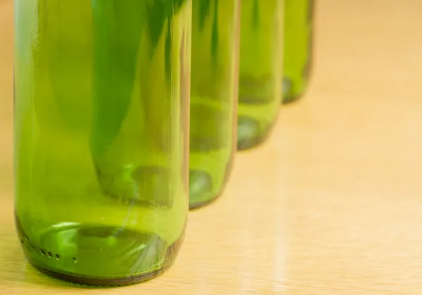 Four green bottles — Stock Photo, Image