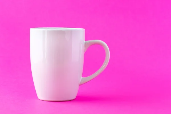 White mug on a pink background — Stock Photo, Image