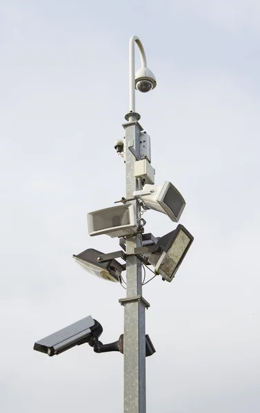 Security lights and cameras on a post — Stock Photo, Image