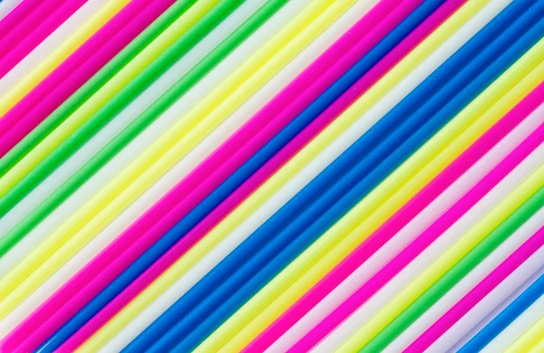 Цветные соломинки в качестве фона — стоковое фото