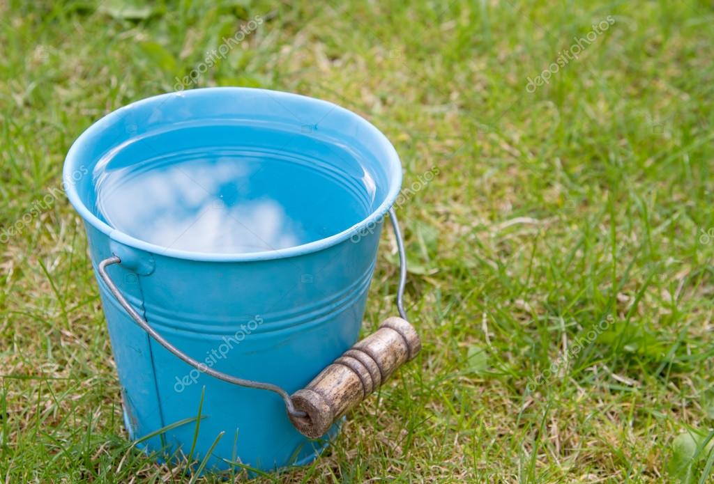 depositphotos_49951119-stock-photo-blue-bucket-of-water-on.jpg