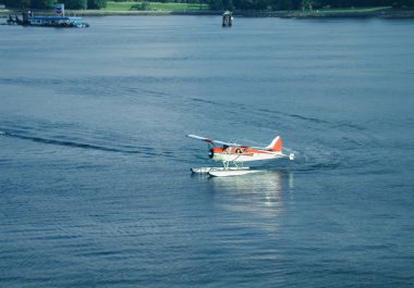 Floatplane Taxiing in Vancouver Harbor clipart