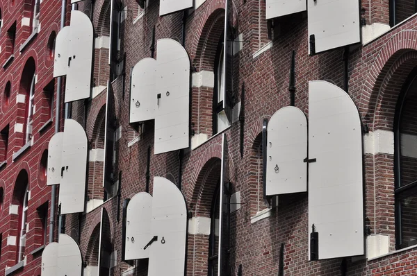 White wooden shutter on Amsterdam houses — Stock Photo, Image