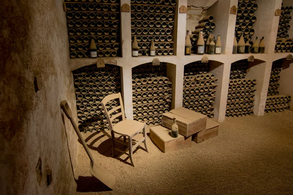 Wine cellar with old wine bottles — Stock Photo, Image