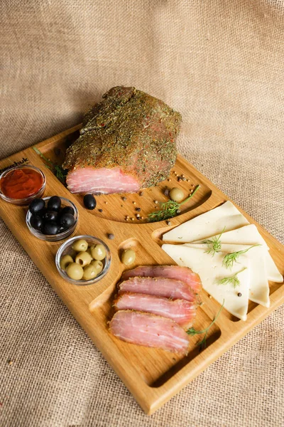 Dry Cured Pork Fillet Wooden Serving Board Cheese Olives Black — Stock Photo, Image