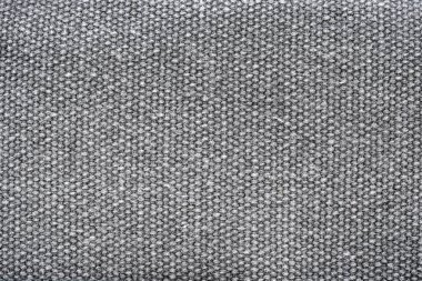 Macro texture on polyester fabric on gray shit