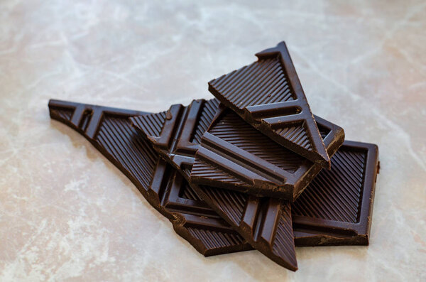 Dark Chocolate Bar Pieces Marble Table Stock Picture