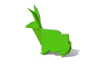 Yeşil origami tavşan üzerinde beyaz izole