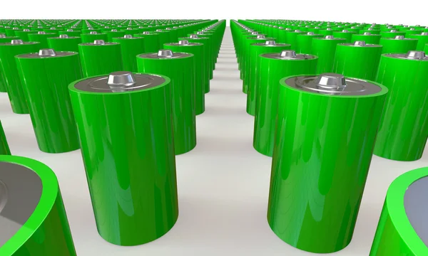 Uma matriz de baterias verdes isoladas em branco — Fotografia de Stock