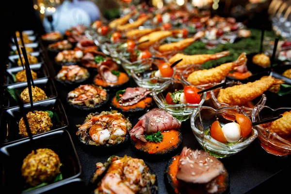 Banquet Meat Bar Cold Snacks Vegetables Fish Rucola Bread Canapes — Stock Photo, Image