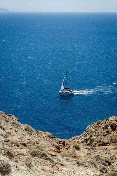 Small yacht in the sea. Top view