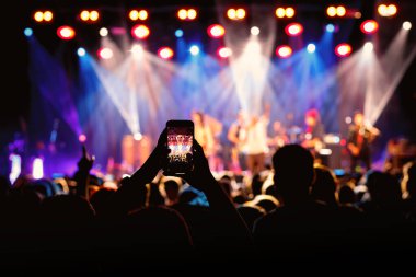 Video recording of the concert using a smartphone.