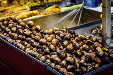 Fried chestnuts on the street. Street food. Roasted chestnuts