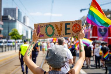 Warsaw, Poland - 25.06.2022: LGBT Pride parade on Warsaw streets. Love banner