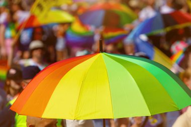 Rainbow umbrella in the city. Lgbt pride