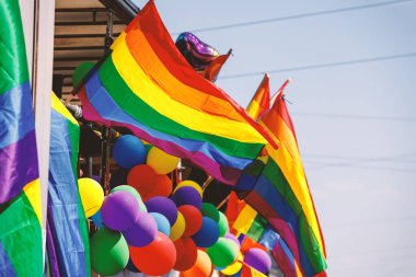 Lgbt pride rainbow flag during parade in the city