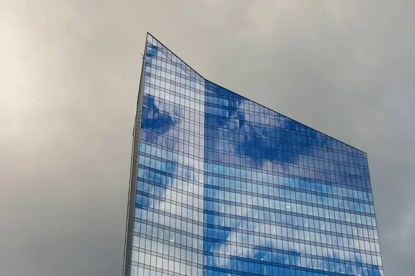 Mirrored Office Building Windows Dramatic Clouds Background — Stok fotoğraf