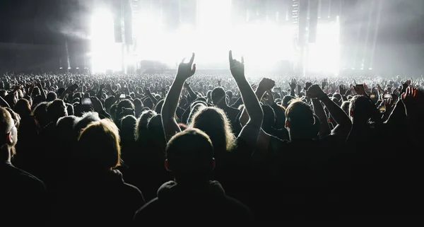 Lot People Raised Hands Concert Event Fans Arms Stage Light — Foto Stock