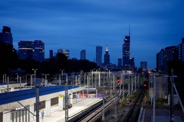 Warsaw, Poland - 19.07.2022: Warszawa Zachodnia - Warsaw West station with Poland capital cityscape