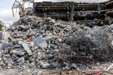 Destroyed building. Ruins of concrete and metal