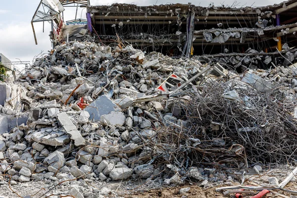 Destroyed building. Ruins of concrete and metal