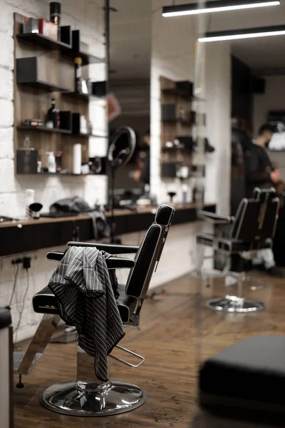 empty chair in the barber shop. beauty saloon