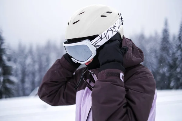 Young Woman Athlete Puts Helmet Goggles Skiing Portrait Man Sports — Stockfoto