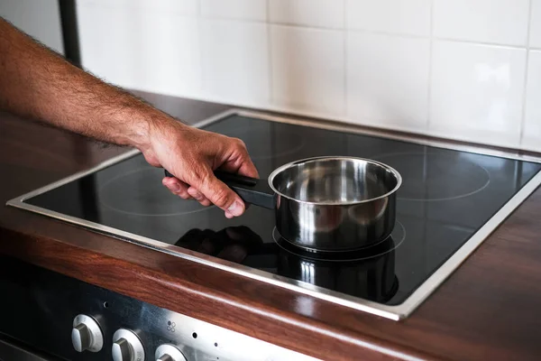 Adult Man Puts Ladle Water Stove Cook Spaghetti — Stockfoto