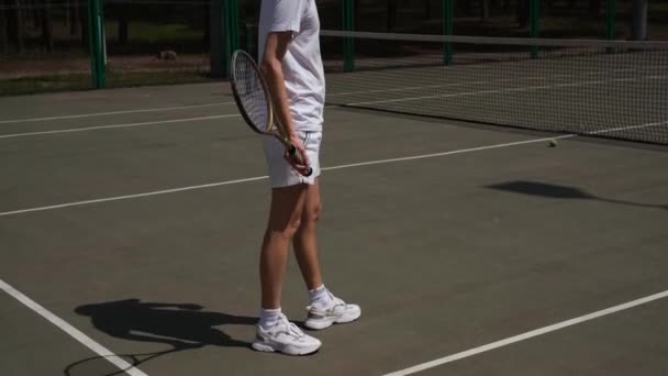 Athlete Stretches His Hand Wrist Playing Tennis Court — Stock Video