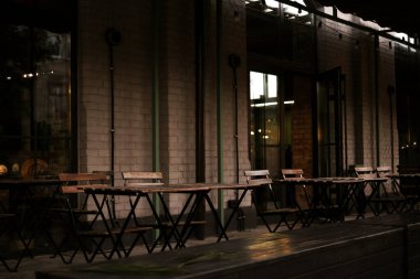 dinner served table in a home interior with panoramic windows and mountain views