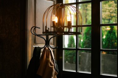 dinner served table in a home interior with panoramic windows and mountain views