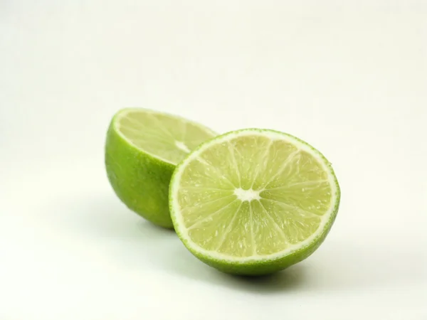 Green lime cut in the center — Stock Photo, Image
