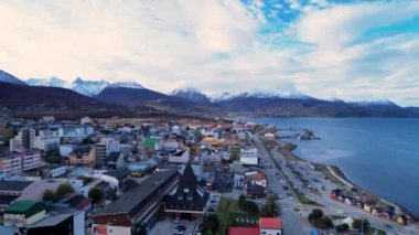 Cityscape of town of Ushuaia Argentina at Tierra del Fuego. Natural landscape of scenic town between mountains. Ushuaia Argentina. Patagonia Argentina at Ushuaia Tierra del Fuego Argentina.