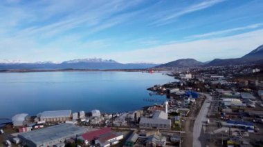 Cityscape of town of Ushuaia Argentina at Tierra del Fuego. Natural landscape of scenic town between mountains. Ushuaia Argentina. Patagonia Argentina at Ushuaia Tierra del Fuego Argentina.