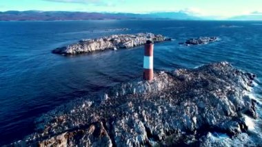 Famous lighthouse of Ushuaia City at Beagle Channel near Chile border. Patagonia Argentina. Called of End of the World  Fin Del Mundo Lighthouse. Ushuaia Argentina Tierra del Fuego province.