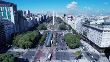 Obelisk Monument Buenos Aires Argentina. Panorama landscape of tourism landmark downtown of capital of Argentina. Tourism landmark. Outdoors downtown city. Urban scenery of Buenos Aires city.