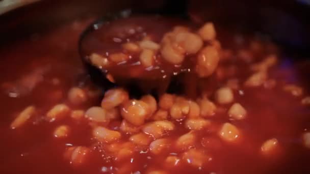 Ladle stirring delicious traditional Mexican pozole in cooking pot — Stock Video