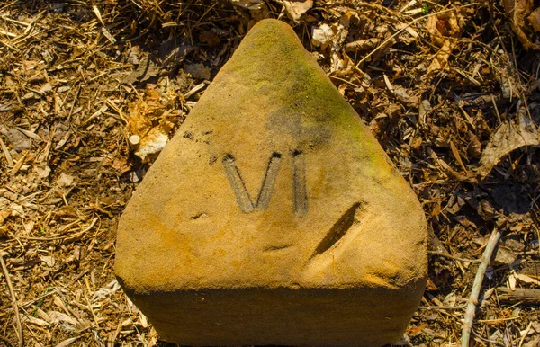 Triangle Sand Stone Engraved Numeral Four Sign — Stok fotoğraf