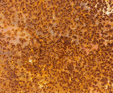 demir paslı yüzey kirli kahverengi, metal kabartmalı arka plan yaşlanmış ve zamana maruz kalmış.