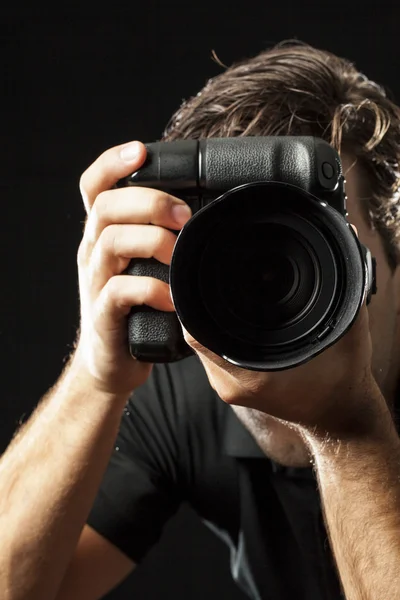 Photographer on black. — Stock Photo, Image