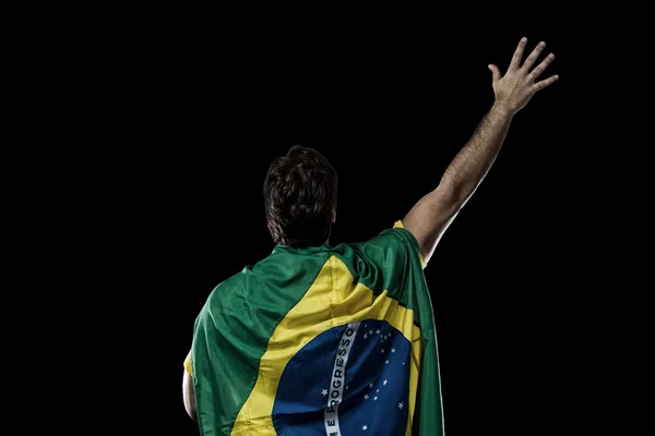 With a Brazilian flag on his back — Stock Photo, Image