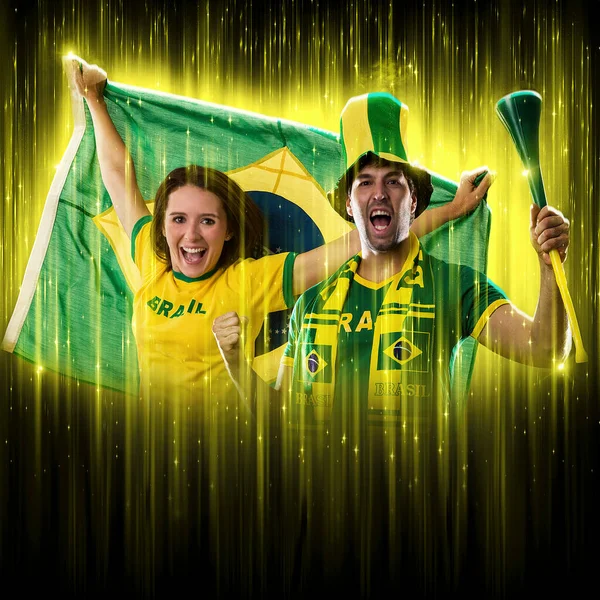 Brazilian Couple Celebrating Cup Black Background Yellow Glow Cheering Brazil —  Fotos de Stock