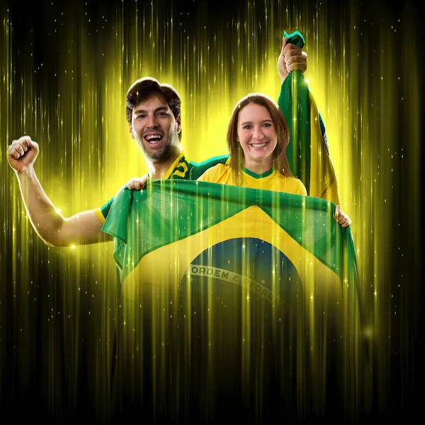 Brazilian Couple Celebrating Cup Black Background Yellow Glow Cheering Brazil —  Fotos de Stock