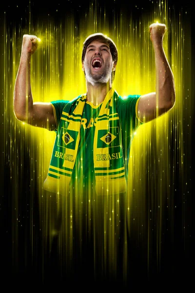 Brazilian Fan Celebrating Yellow Black Backgroun Cheering Brazil Champion — Zdjęcie stockowe