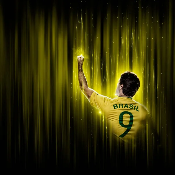 Brazilian Soccer Player Yellow Black Background — Fotografie, imagine de stoc