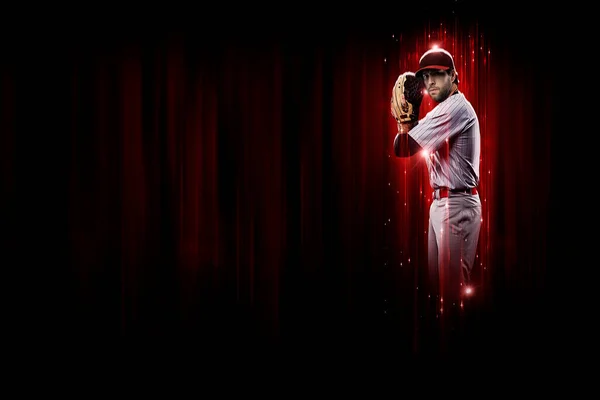 Παίκτης Του Μπέιζμπολ Πίτσερ Κόκκινη Στολή Μαύρο Και Κόκκινο Φόντο — Φωτογραφία Αρχείου