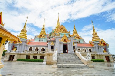 Scenery of the famous stupa named Phra Mahathat Chedi Phakdee Prakat, the great Rattanakosin-style pagoda in Prachuap Khiri Khan province, Thailand.