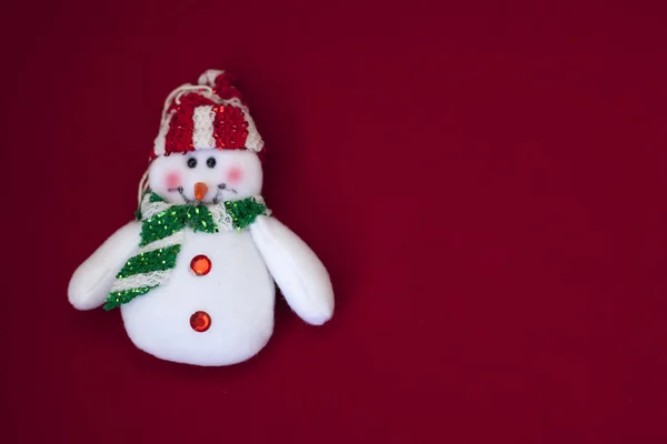 White snowman on red background — Stock Photo, Image